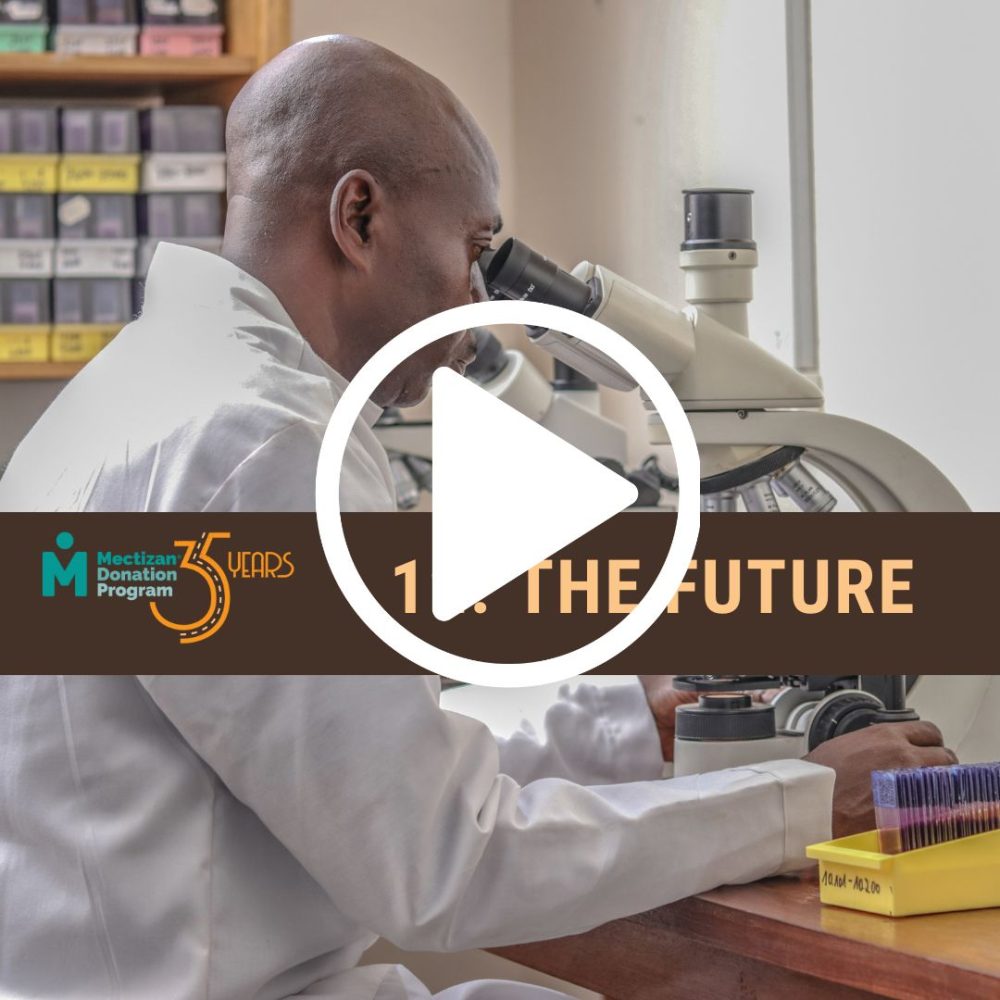 A man wearing a lab coat looks into a microscope. The text reads Mectizan Donation Program 35 Years number 12 The Future. There is a play video icon superimposed on the image.